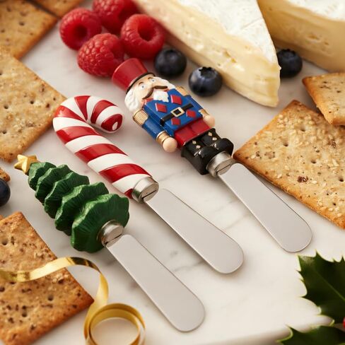 أدوات توزيع الجبن من شركة Supreme Housewares، مقابض من الراتنج مرسومة يدويًا مع شفرات من الفولاذ المقاوم للصدأ لتوزيع الجبن الكريمي والزبدة والمربى، تصميمات متنوعة لعيد الميلاد، مجموعة من 4 قطع in Kuwait