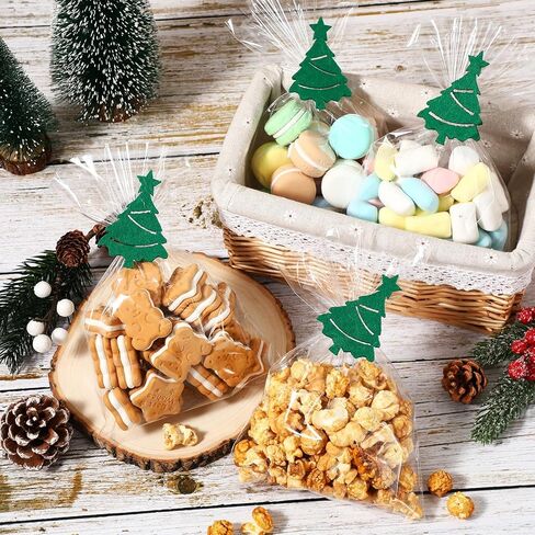 Tenceur 25 Pcs Christmas Clear Treat Bags with Felt Christmas Tree Twist Ties, 6 x 9 Inch Cellophane Candy Bags for Xmas Party Favor Cake Pop Snacks Cookies Goodie Packing in Saudi Arabia