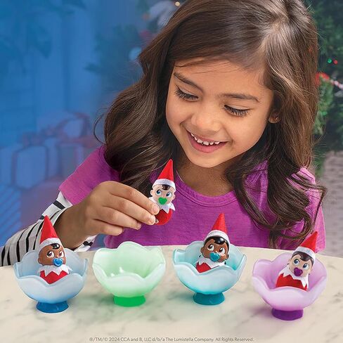 حزمة The Elf on the Shelf: Scout Elf Girl Light Tone، Boy + Girl Frost Pips وقمصان Elf Mate (3 قطع) in Saudi Arabia