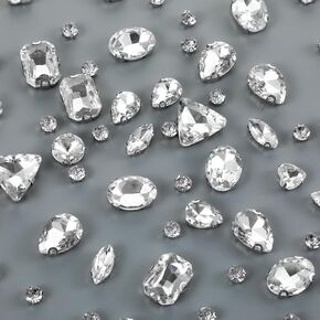 130 قطعة خياطة على أحجار الراين للصياغة، أحجار كريمة زجاجية كريستالية بأشكال مختلطة مع زخارف مخلب مسطحة عقلية، أحجار الراين المبهرة لصنع المجوهرات والملابس والأحذية وخياطة الملابس، أبيض in Kuwait