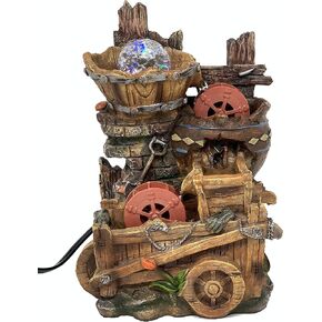 Tabletop Fountain Water Mill in Broken Jar on Cart in Saudi Arabia