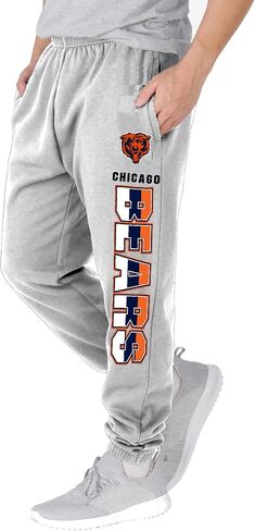NFL Kids Youth 8-20 Officially Licensed Primary Team Logo Stripe Fleece Lined Football Sweatpants Joggers Pants in Saudi Arabia