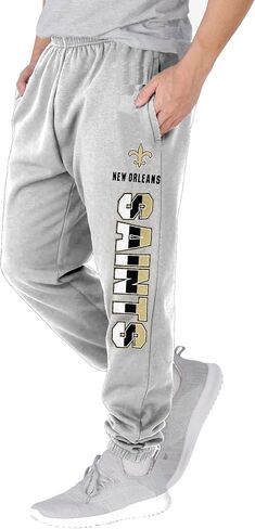 NFL Kids Youth 8-20 Officially Licensed Primary Team Logo Stripe Fleece Lined Football Sweatpants Joggers Pants in Saudi Arabia