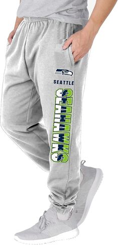 NFL Kids Youth 8-20 Officially Licensed Primary Team Logo Stripe Fleece Lined Football Sweatpants Joggers Pants in Saudi Arabia