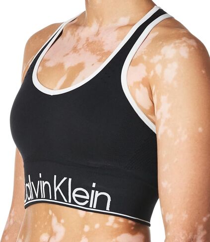 حمالة صدر رياضية ذات وجهين للنساء من Calvin Klein Performance متوسطة التأثير (مقاس قياسي ومقاس إضافي) in Kuwait