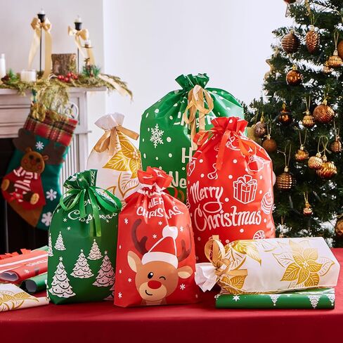 JOYIN 36 PCS Christmas Drawstrings Gift Bags Assorted Sizes, Xmas Foil Reusable Wrapping Gift Plastic Bag (Large Medium Small) for Christmas Holiday Party Decorations in Saudi Arabia