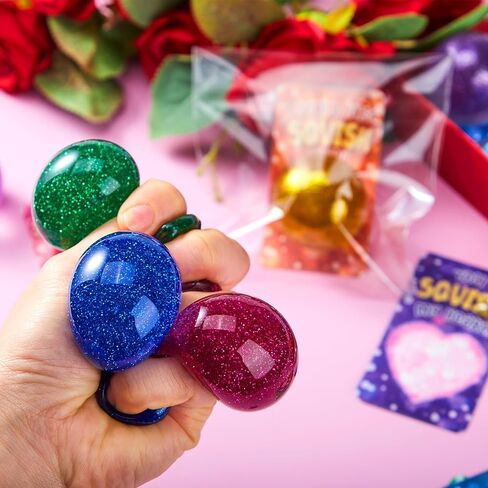 JOYIN 28 Packs Valentine's Day Stretchy Balls with Cards, Classroom Exchange Gift for Kids, Valentine's Party Favors, Classroom Holiday Reward Prizes, Stress Relief Stretch Balls in Saudi Arabia