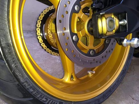 Forged Alloy Angled Valve Stem with Pre-Applied Threadlocker Nut, 0.453in (11.3mm) Size, Orange in Saudi Arabia