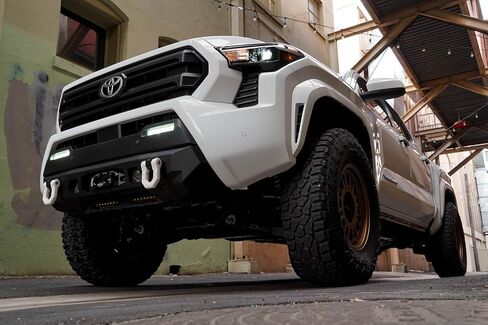 DV8 Centric Front Bumper for 2024 Toyota Tacoma | One 20-Inch Single Row Light Bar & Two 3-Inch Pod Light Mounts | Integrated Standard Winch & D-Ring Mounts | Micro-Texture Black Powder Coat Finish in Saudi Arabia