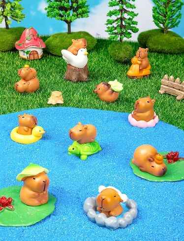 مجموعة تماثيل كابيبارا الصغيرة 15 قطعة من تماثيل كابيبارا لتزيين الكيك من الراتنج وأشكال حيوانات صغيرة مع ملحقات لبيت الدمى والحديقة الخيالية وديكور عيد الميلاد in Kuwait