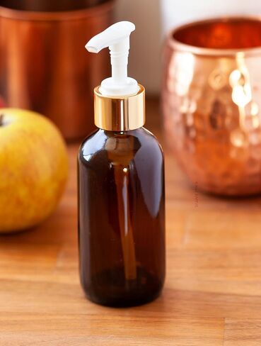 JUVITUS 4 oz / 120 ml Amber Glass Boston Round Bottle with Gold Lotion Pump + Funnel (4) in Saudi Arabia