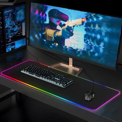 لوحة ماوس ألعاب كبيرة RGB، لوحة ماوس ألعاب ممتدة لمكتب كامل مقاس XL، 14 وضعًا متوهجًا، 7 ألوان LED، تحكم وسرعة متوازنة - قاعدة مطاطية غير قابلة للانزلاق وسطح قماش أملس in Saudi Arabia