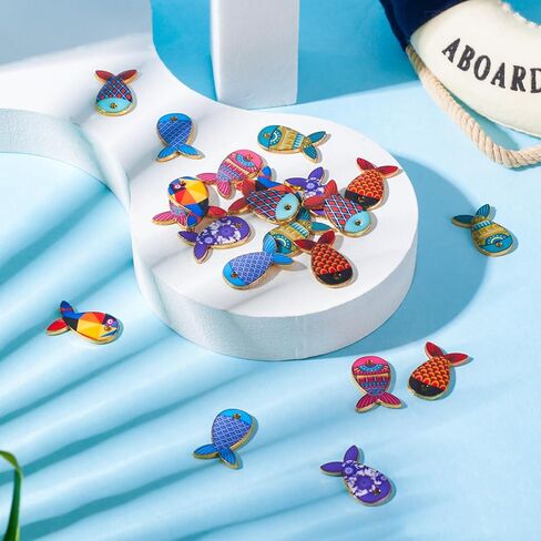 Craftdady 28Pcs Enamel Fish Charms: 7 Styles Colorful Pattern Fish Rack Pendants Cute Ocean Animal Charms for DIY Earring, Bracelet, Necklace Making in Saudi Arabia