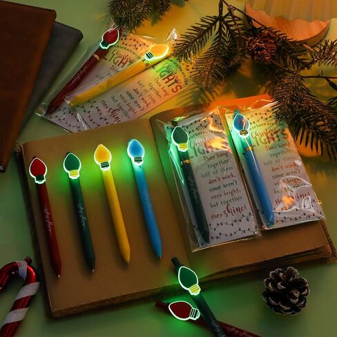 24 Sets Glowing in The Dark Christmas Pen Coworker Appreciation Gift Bulk Luminous Light Bulb Christmas Office Gift Novelty Black Ink Pen with Themed Card Tie Bag for Teacher Staff Nurse in Saudi Arabia