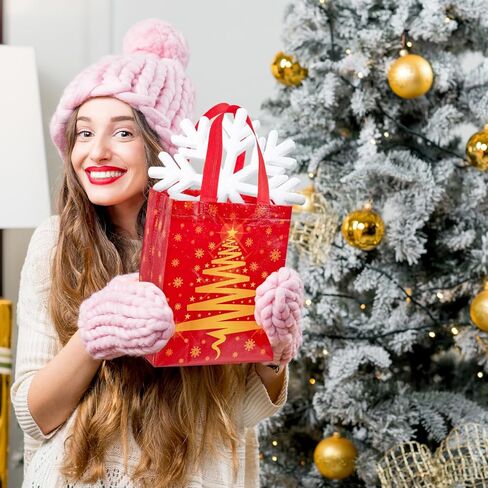 Threlaco 30 Pcs Christmas Gift Bags Bulk Reusable Non Woven Christmas Tree Red and Gold Goodie Treat Bags with Handles for Xmas Holiday Party Favors Gifts Wrapping, 10 x 8 x 4 Inch in Saudi Arabia