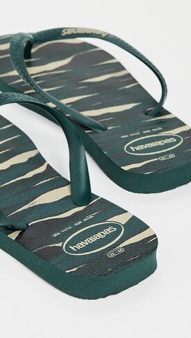 صندل مموه للجنسين من Havaianas - شبشب فليب فلوب بطباعة جريئة - أزرق نيلي، 10C للأطفال الصغار in Kuwait