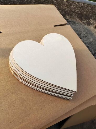 10 Pieces 8 inch Heart Shape Unfinished Wood Heart Cutout Shapes Natural Wooden Slices in Saudi Arabia