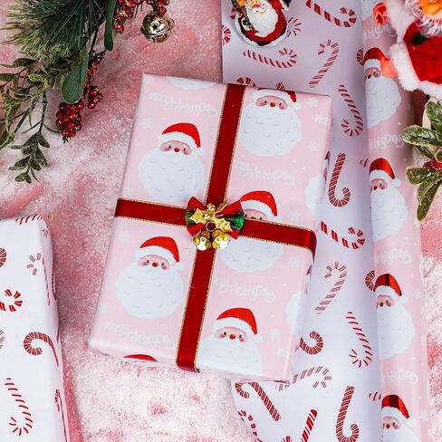 لفات ورق تغليف عيد الميلاد من Merture Pink Santa - لفة صغيرة - 17 بوصة × 32.8 قدم (46.5 قدم مربع. ttl.) - غلاف هدايا وردي للفتيات مع تصميم سانتا كلوز اللطيف وقصب الحلوى لعيد الميلاد، والحفلات، والعطلات، والاحتفال بالمهرجانات in Kuwait