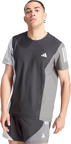 تي شيرت رجالي من adidas Own The Run Colorblock، أزرق داكن/حبر Preloved/قرمزي Preloved in Saudi Arabia