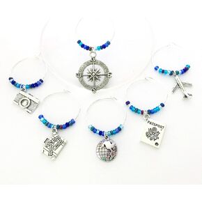 Travel themed Wine Charms: Charms include Camera, Compass, Suitcase, Globe, Passport, and an Airplane. Set of 6. MULTI-BLUE BEADS