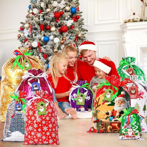AhfuLife 32pcs Christmas Drawstring Gift Bags, 5 Assorted Size Xmas Gift Wrapping Bags with Tags, Christmas Extra Large Medium Small Gift Bags Bulk for Party Decorations in Saudi Arabia