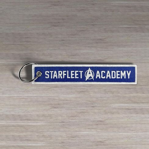 سلسلة مفاتيح من القماش باللون الأزرق/الأبيض من Starfleet Academy مقاس 5.5 بوصة × 1 بوصة (مفردة) in Saudi Arabia