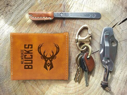 Rico Industries NBA Milwaukee Bucks Men’s Trifold Brown Wallet - Premium 9 Pocket Laser-Engraved Team Logo on Vegan Leather - Minimalist Design, ID Window, Credit Card Holder - Ideal Men’s Gift in Saudi Arabia