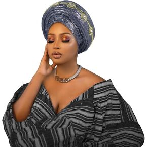 The traditional African women's headscarf is embroidered with golden patterns and is made of elastic fabric. in Saudi Arabia