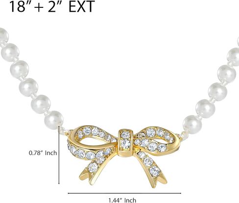 عقد من Juicy Couture مزين بفيونكة من اللؤلؤ الصناعي وأحجار شفافة، عقد بقلادة على شكل فيونكة ذهبية اللون مقاس 18 بوصة + 2 بوصة in Kuwait