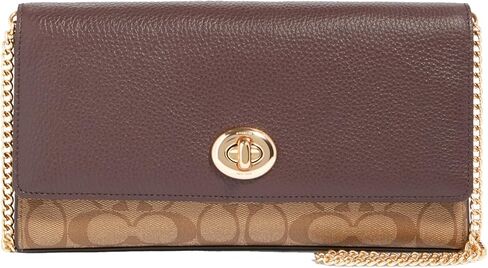 Coach Signature Snake Mix Bowery Clutch in Saudi Arabia