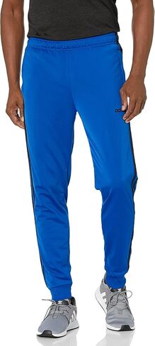 adidas Men's Athletics Essentials 3 Stripes Tapered Tricot Pant in Saudi Arabia