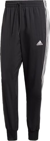 adidas Men's Athletics Essentials 3 Stripes Tapered Tricot Pant in Saudi Arabia