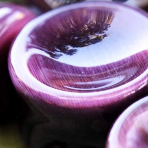 Natural Purple Cat's Eye Concave Stone Saddle Plug in Saudi Arabia