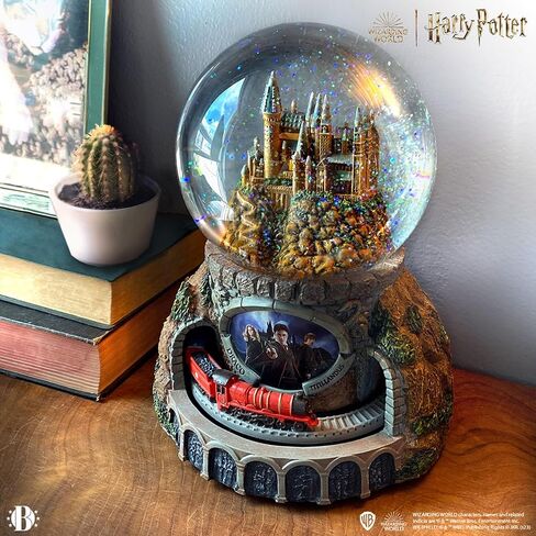 The Bradford Exchange Harry Potter Hogwarts Express Musical Snow Globe, Light-Up Castle, Moving Train with Hedwig's Theme in Saudi Arabia