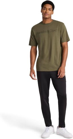 Reebok Men's Grind Tapered Oblong Pant, Standard Fit, 30" Inseam, Lightweight Stretch Poly Fabric in Saudi Arabia