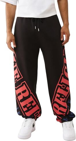 True Religion Overt Arch Logo Baggy Joggers for Men – Oversized Sweatpants with Drawstring Waist & Pockets in Saudi Arabia