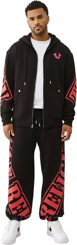 True Religion Overt Arch Logo Baggy Joggers for Men – Oversized Sweatpants with Drawstring Waist & Pockets in Saudi Arabia