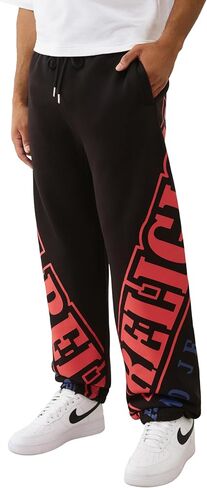 True Religion Overt Arch Logo Baggy Joggers for Men – Oversized Sweatpants with Drawstring Waist & Pockets in Saudi Arabia