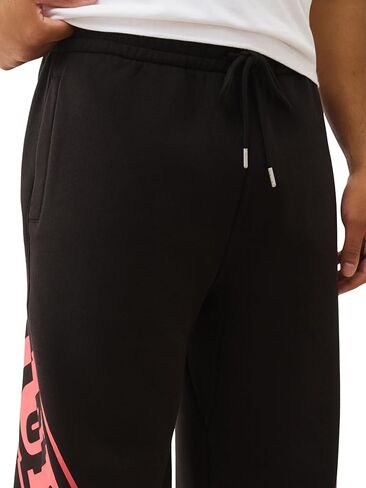 True Religion Overt Arch Logo Baggy Joggers for Men – Oversized Sweatpants with Drawstring Waist & Pockets in Saudi Arabia