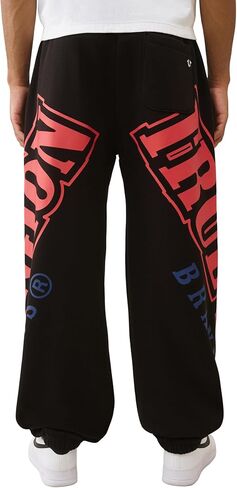 True Religion Overt Arch Logo Baggy Joggers for Men – Oversized Sweatpants with Drawstring Waist & Pockets in Saudi Arabia