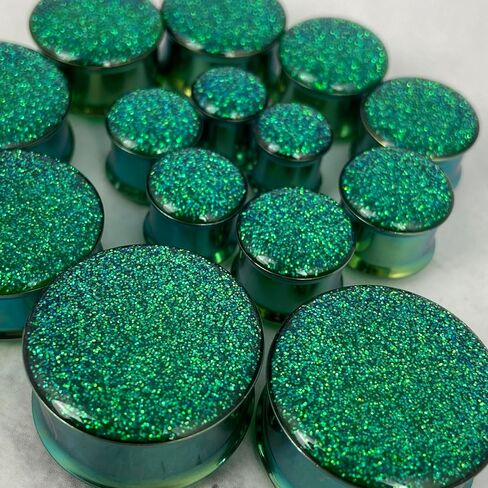 مجوهرات الجسم Mystic Metals ذات لمعان أخضر مزدوج مضمن في سدادات فولاذية خضراء - تباع كزوج in Saudi Arabia