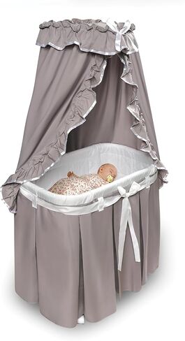 Badger Basket Majesty Canopy Bassinet, Rocking Baby Cradle Bed with Mattress, Bedding, and Storage, Oval White/Pink in Saudi Arabia