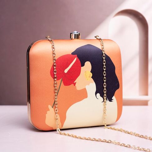 Elegant Evening Clutch Purse with Artistic Print Design, Coral Orange with Gold Chain Strap, Fashion Statement Handbag for Special Occasions in Saudi Arabia
