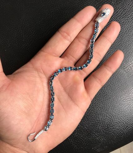 Natural London Blue Topaz Cobra Bracelet in 925 Sterling Silver | 6x4mm Oval-Cut London Blue Topaz | 12.45 Carat Blue Gem Tennis Bracelet | Engagement Gift in Saudi Arabia
