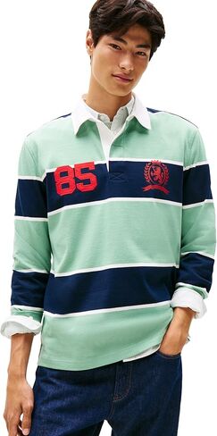 قميص بولو الرجبي المخطط خفيف الوزن للرجال من Tommy Jeans مع شعار Crest in Kuwait
