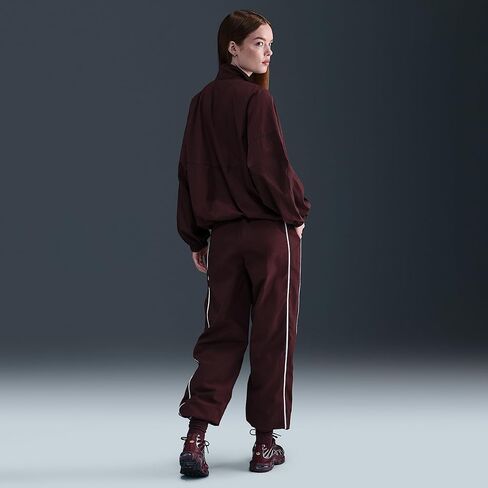 بنطال Nike Sportswear Windrunner المنسوج للنساء (بورجوندي كراش/أزرق سيليستين/شراع) in Kuwait