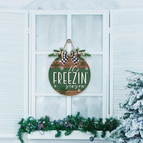 Deroro Winter It's Freezin' Season Green Front Door Sign, Farmhouse Snowflake Wood Hanger Outdoor Outside Porch Decor, Rustic Christmas Wooden Wreath Indoor Wall Hanging Decoration with Plaid Bow in Saudi Arabia