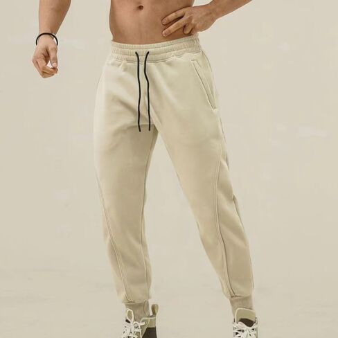 Men's Baggy Sweatpants Elastic Waist Drawstring Tapered Sweatpant Lightweight Workout Running Pant with Pockets in Saudi Arabia
