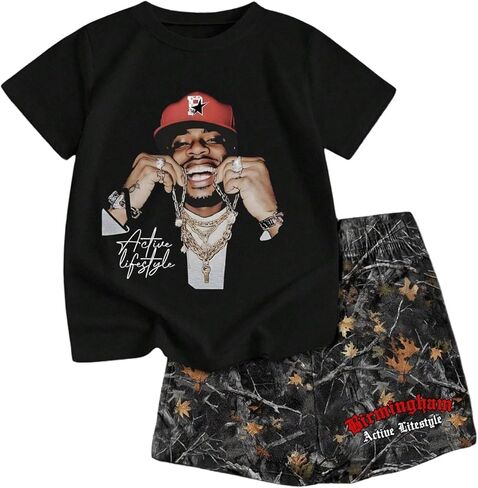 Verdusa Boy's 2 Piece Hip Hop Outfits Graphic Crewneck Tee Top and Letter Print Camo Shorts Set in Saudi Arabia