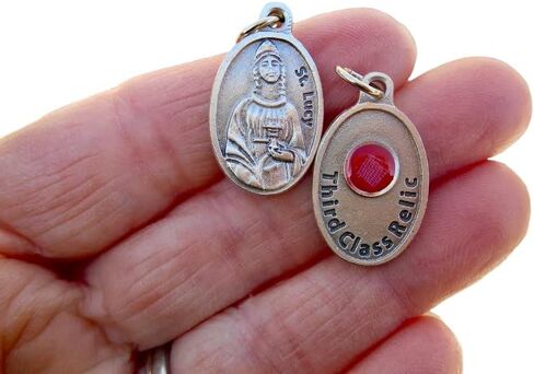 THIRD CLASS RELIC MEDAL ST LUCY MADE IN ITALY PIECE OF CLOTH THAT TOUCHED HER 1rst CLASS RELICS in Saudi Arabia
